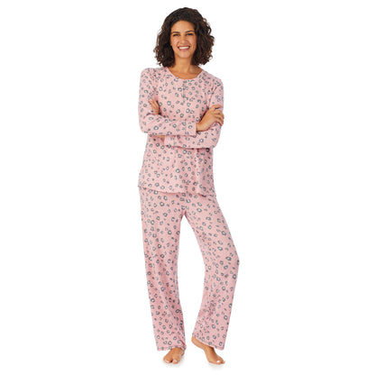 Pink Pop Animal; Model is wearing size S. She is 5’9”, Bust 32”, Waist 24”, Hips 34.5”. @A lady wearing a pink long sleeve pajama set with pop animal pattern.