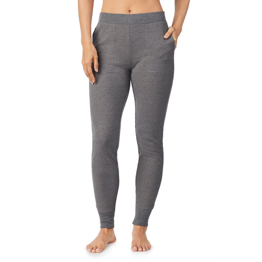 Stone Grey Heather; Model is wearing size S. She is 5’9”, Bust 32”, Waist 25.5”, Hips 36”. @A lady wearing a stone grey heather legging.