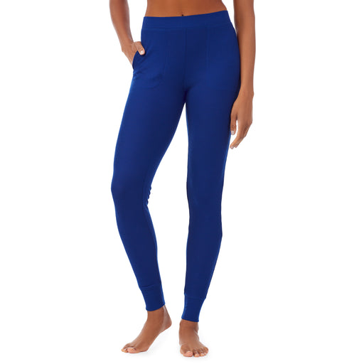 Royal Blue; Model is wearing size S. She is 5’9”, Bust 32”, Waist 25.5”, Hips 36”. @A lady wearing a royal blue legging.