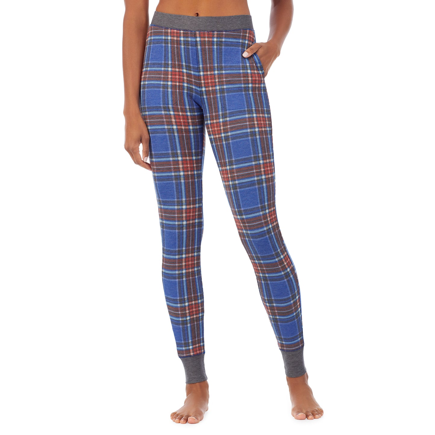Red Blue Plaid; Model is wearing size S. She is 5’9”, Bust 32”, Waist 25.5”, Hips 36”. @A lady wearing a red blue plaid legging.