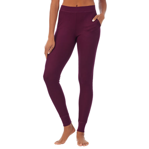 Grape; Model is wearing size S. She is 5’9”, Bust 32”, Waist 25.5”, Hips 36”. @A lady wearing a grape legging.