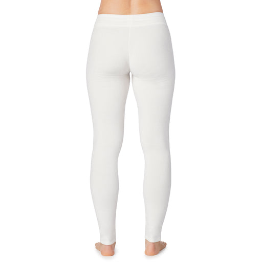Off White; Model is wearing size S. She is 5’9”, Bust 32”, Waist 25.5”, Hips 36”.@lower body of a lady wearing white legging