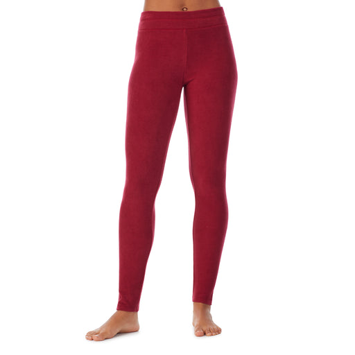 Rhubarb; Model is wearing size S. She is 5’9”, Bust 32”, Waist 25.5”, Hips 36”.@lower body of a lady wearing red legging