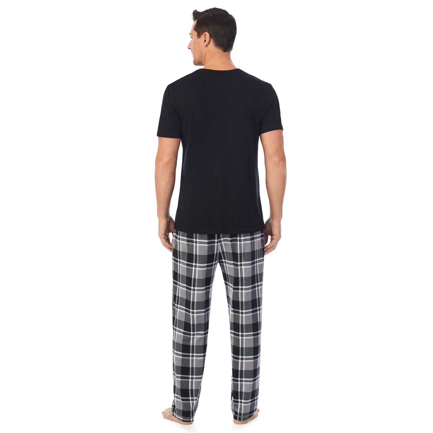 Dark Grey Palms;Model is wearing size M. He is 6'2", Waist 32", Inseam 32".@ A lady wearingMens Short Sleeve Crew Neck Top and Pant Pajama Set with Dark Grey Palms print