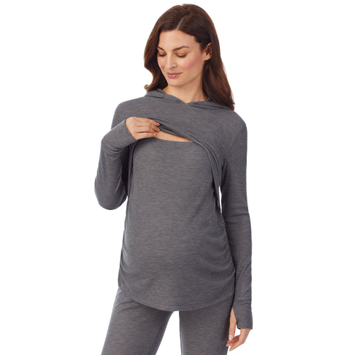 Stone Grey Heather; Model is wearing size S. She is 5’9”, Bust 34”, Waist 24.5”, Hips 36.5”. @A lady wearing a stone grey heather long sleeve maternity hoodie top. #Model is wearing a maternity bump.