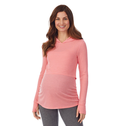 Bright Coral Heather; Model is wearing size S. She is 5’9”, Bust 34”, Waist 24.5”, Hips 36.5”. @A lady wearing a bright coral heather long sleeve maternity hoodie top. #Model is wearing a maternity bump.