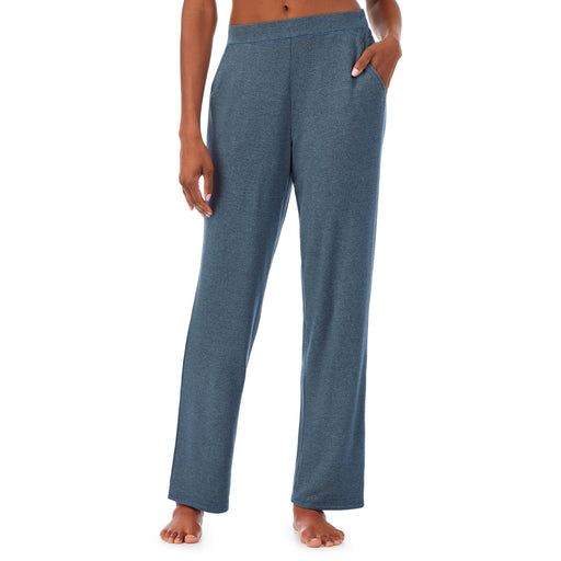 Cloud Blue Heather; Model is wearing size S. She is 5’10”, Bust 34”, Waist 24”, Hips 34”. @A lady wearing a cloud blue heather lounge pant.