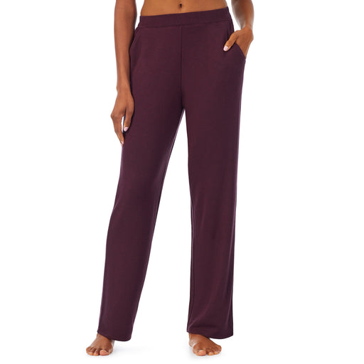Grape Heather; Model is wearing size S. She is 5’10”, Bust 34”, Waist 24”, Hips 34”. @A lady wearing a grape heather lounge pant.