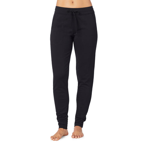 lower body of a model wearing black jogger pant