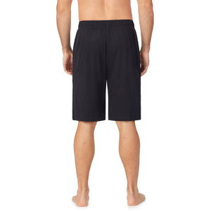  A lady wearingMens Far-Infrared Enhance Sleep Pant with Black print