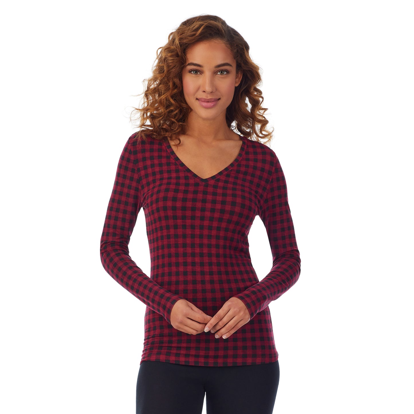Rhubarb Buffalo; Model is wearing size S. She is 5’9”, Bust 34”, Waist 23”, Hips 35”. @A lady wearing a red buffalo long sleeve stretch V-neck t-shirt.
