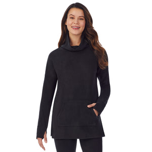 upper body of a lady wearing black long sleeve tunic