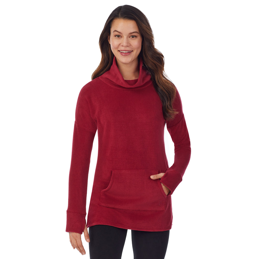 upper body of a lady wearing red long sleeve tunic
