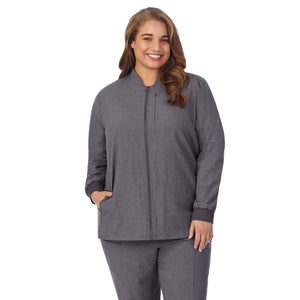  A lady wearing charcoal heather scrub jacket plus.