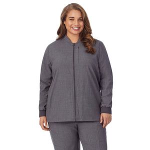 A lady wearing charcoal heather scrub jacket plus.
