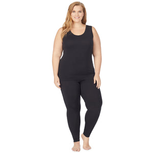A lady wearing a black  sleeveless reversible tank plus.