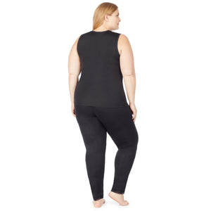 A lady wearing a black sleeveless lace edge V-Neck tank plus.