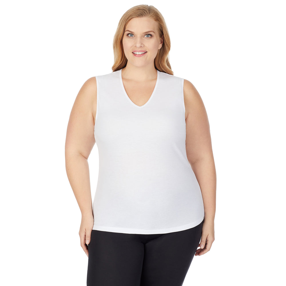 A lady wearing Softwear Lace Edge V-Neck Tank PLUS in White
