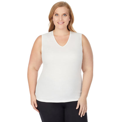 Ivory; Model is wearing size 1X. She is 5'9", Bust 38", Waist 36", Hips 48.5". @A lady wearing a ivory sleeveless lace edge V-Neck tank plus.