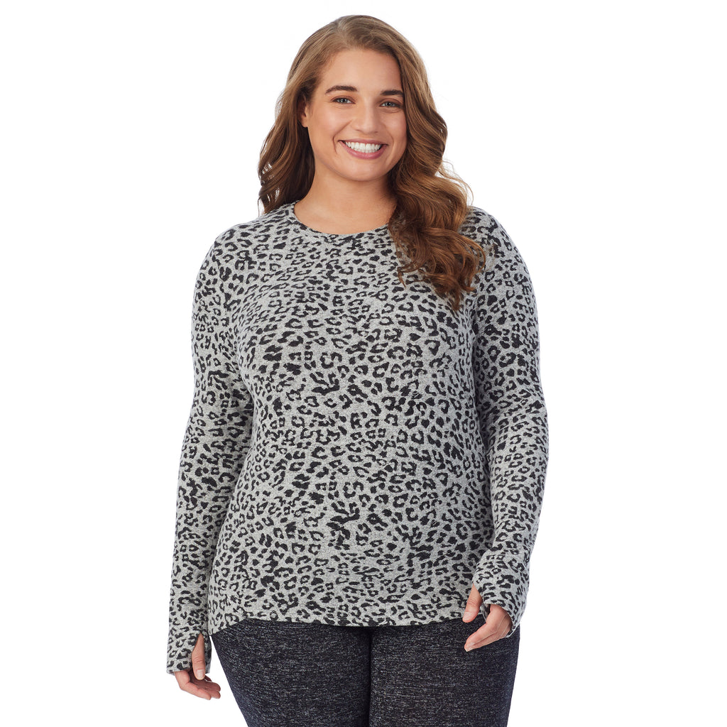 A lady wearing a grey animal long sleeve crew plus.