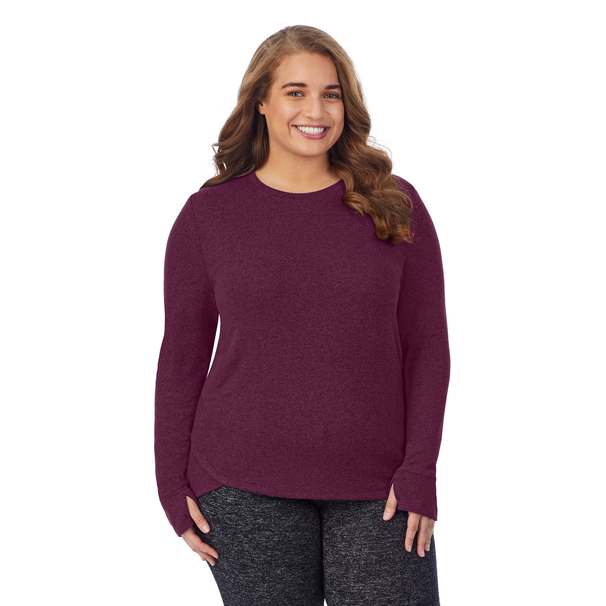 Marled Grape; Model is wearing size 1X. She is 5'7", Bust 42.5", Waist 34.5", Hips 46". @A lady wearing a marled grape long sleeve crew plus.