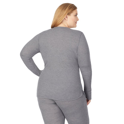 Stone Grey Heather; Model is wearing size 1X. She is 5'9", Bust 38", Waist 36", Hips 48.5". @A lady wearing a  stone grey heather long sleeve crew plus.