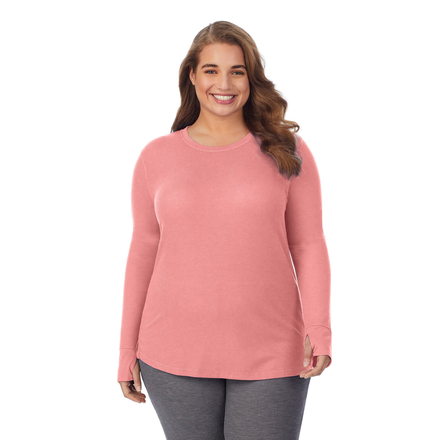 Bright Coral Heather; Model is wearing size 1X. She is 5'7", Bust 42.5", Waist 34.5", Hips 46". @A lady wearing a  bright coral heather long sleeve crew plus.
