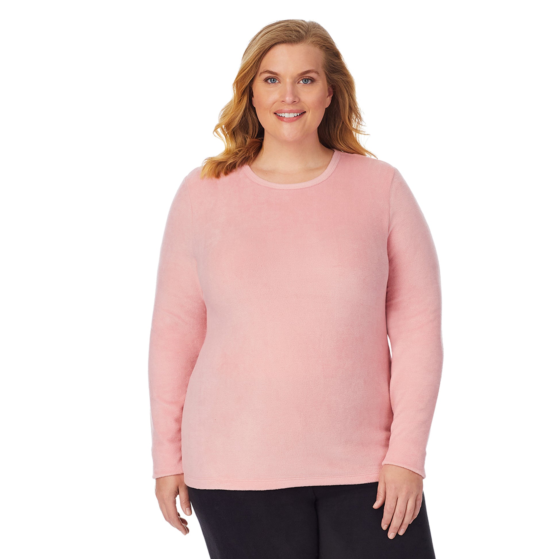 Powder Pink; Model is wearing size 1X. She is 5'7", Bust 42.5", Waist 34.5", Hips 46".@Upper body of a lady wearing pink long sleeve crew