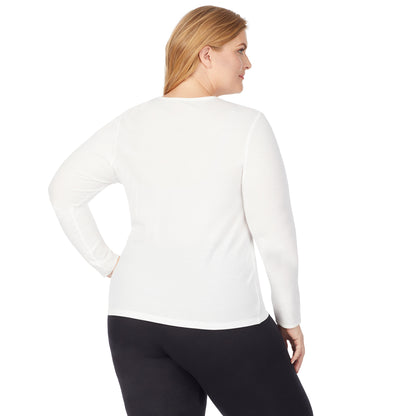 Ivory; Model is wearing size 1X. She is 5'9", Bust 38", Waist 36", Hips 48.5". @A lady wearing a ivory long sleeve lace edge V-neck plus.
