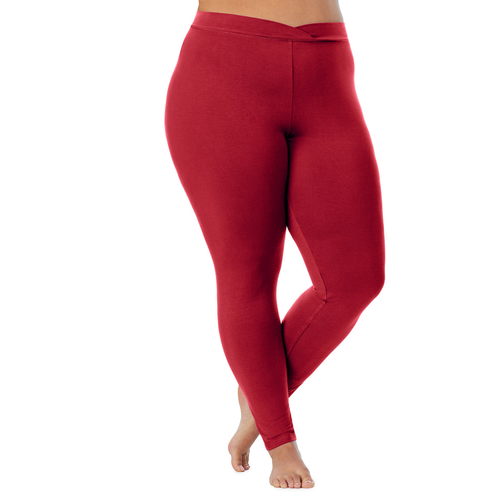 A lady wearing a rhubarb stretch legging plus.