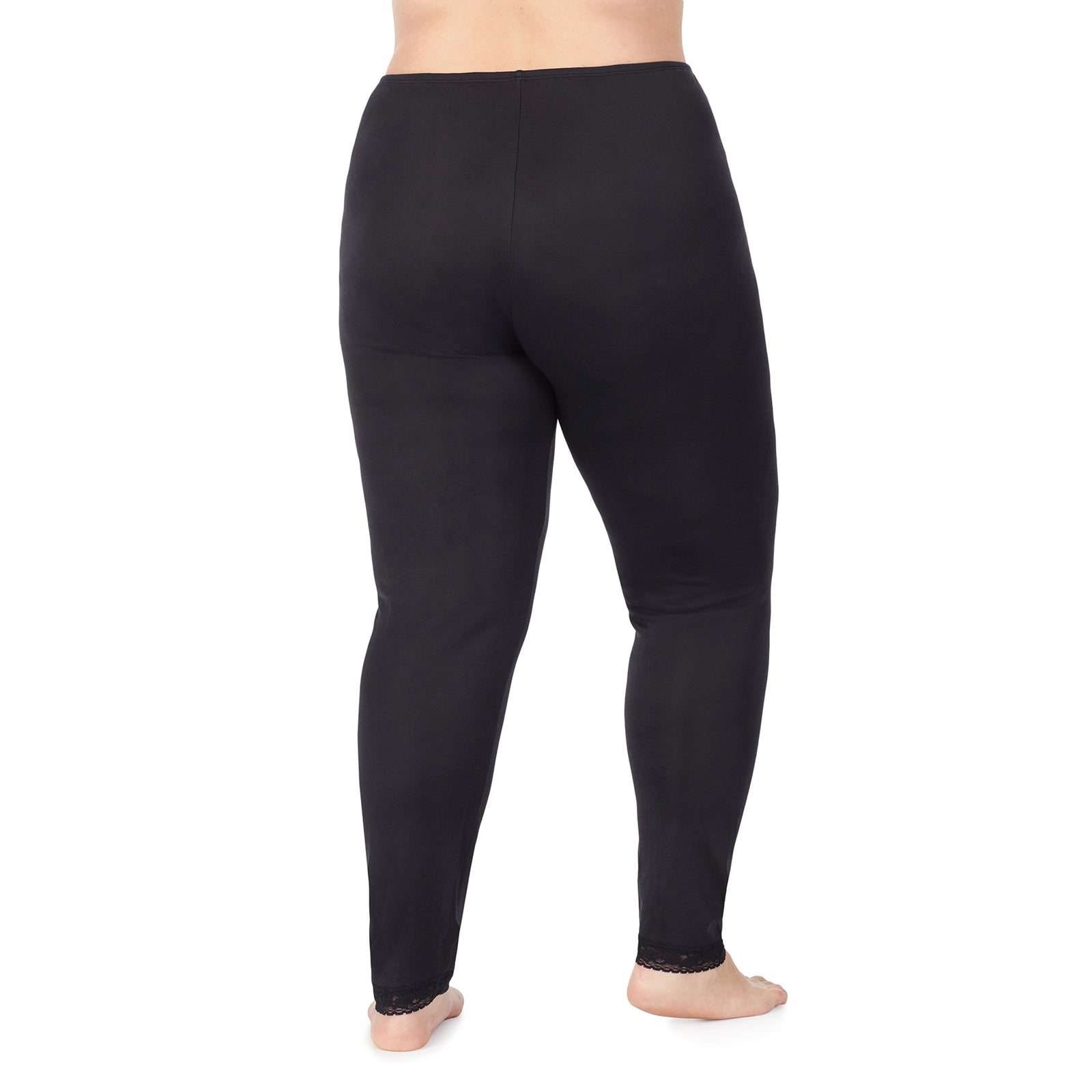 Black; Model is wearing size 1X. She is 5'9", Bust 38", Waist 36", Hips 48.5". @A lady wearing a black lace edge legging plus.
