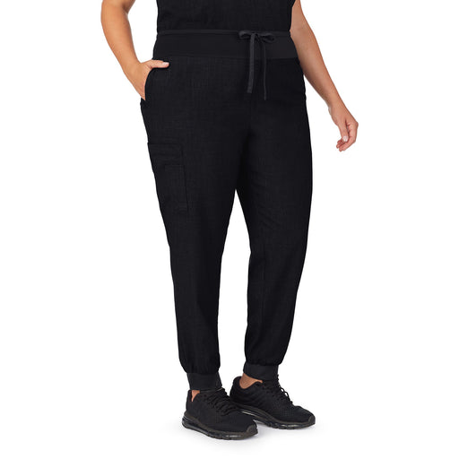 A lady wearing black scrub jogger pant plus.