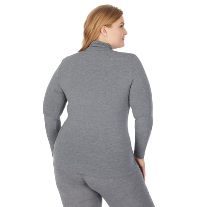 Charcoal Heather; Model is wearing size 1X. She is 5'9", Bust 38", Waist 36", Hips 48.5". @A lady wearing a charcoal heather long sleeve stretch turtleneck t-shirt plus.