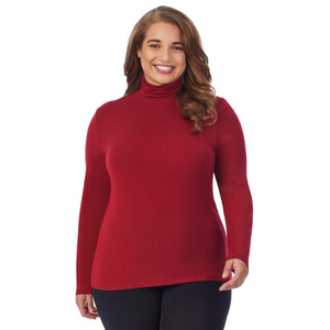 A lady wearing a rhubarb long sleeve stretch turtleneck t-shirt plus.