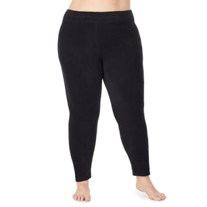 lower body of a lady wearing black legging !59% Polyester, 35% Recycled Polyester, 6% Spandex !