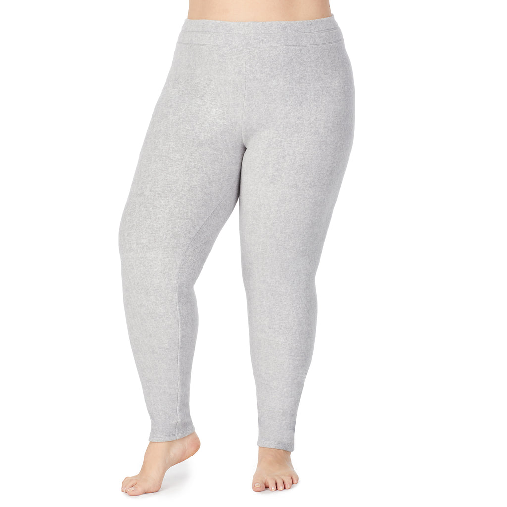lower body of a lady wearing light grey legging !59% Polyester, 35% Recycled Polyester, 6% Spandex !