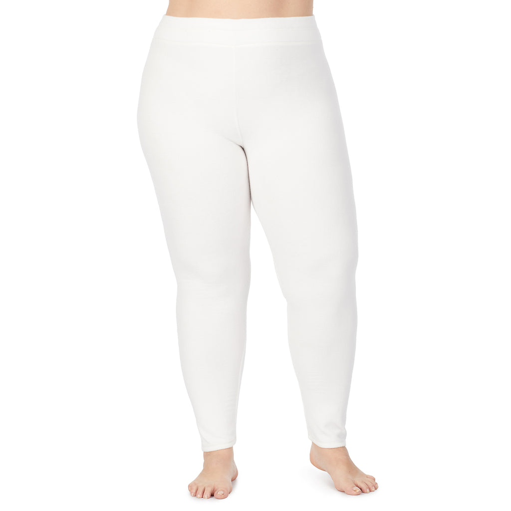 lower body of a lady wearing white legging !59% Polyester, 35% Recycled Polyester, 6% Spandex !