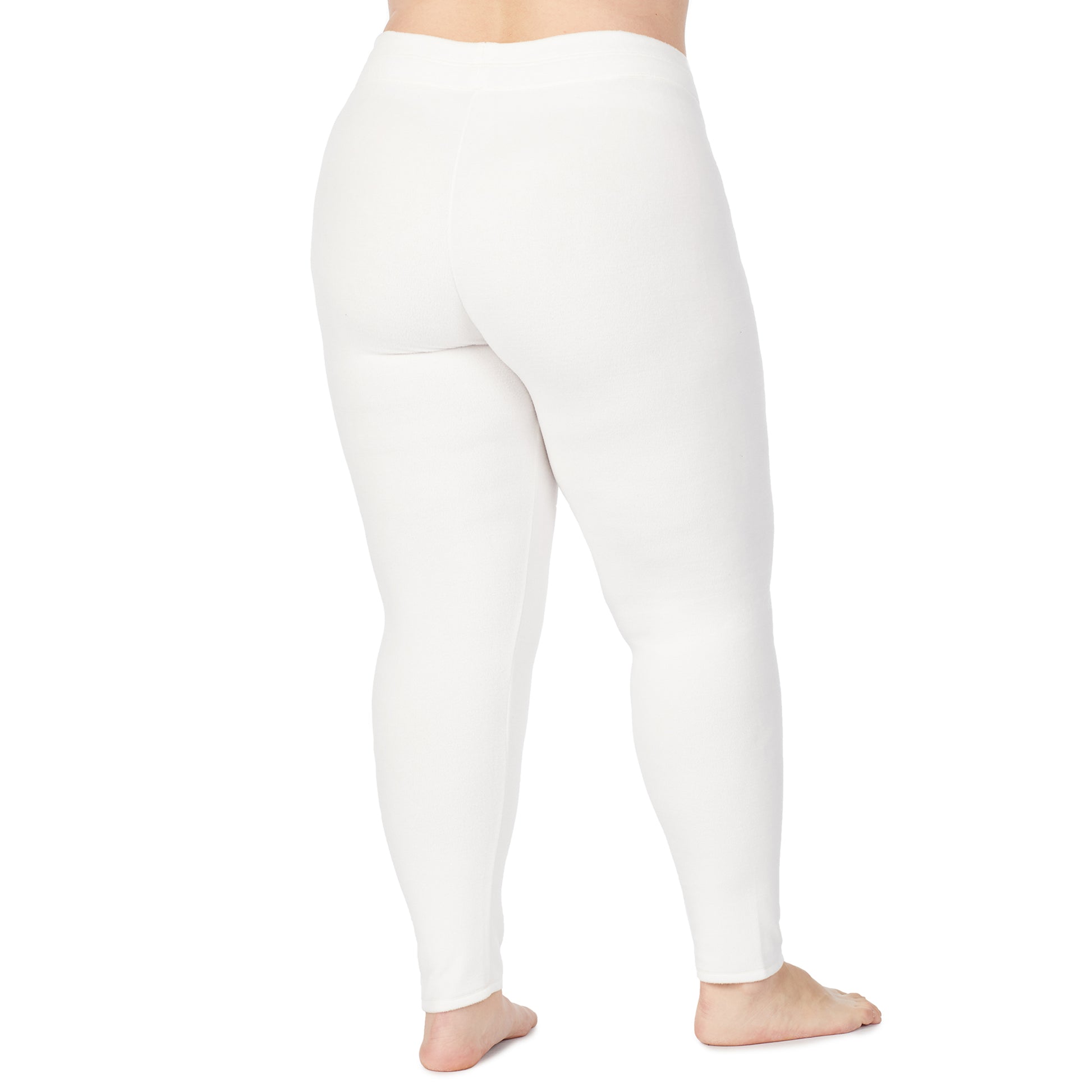 Off White; Model is wearing size 1X. She is 5'9", Bust 38", Waist 36", Hips 48.5".@lower body of a lady wearing white legging