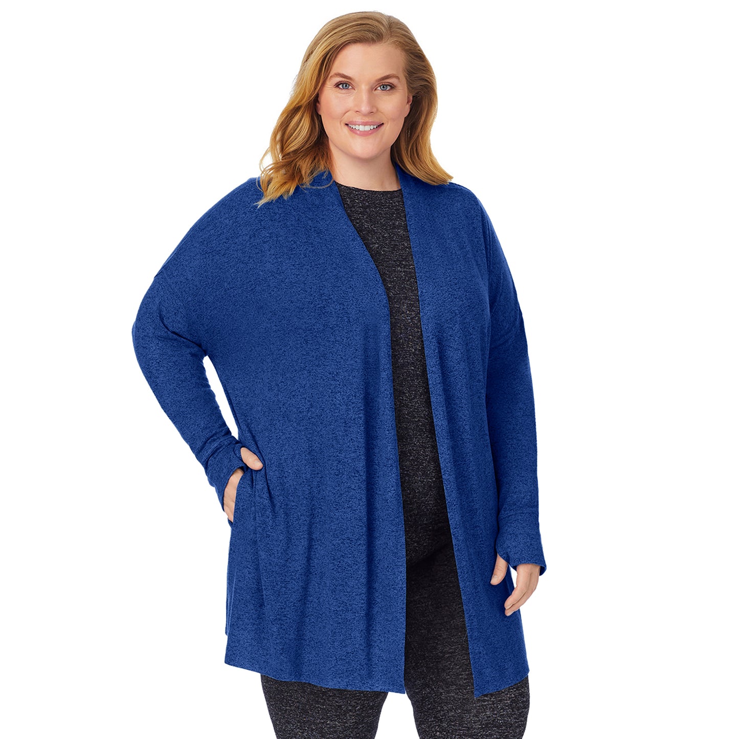 Marled Royal Blue; Model is wearing size 1X. She is 5'9", Bust 38", Waist 36", Hips 48.5". @A lady wearing a marled royal blue long sleeve wrap plus.