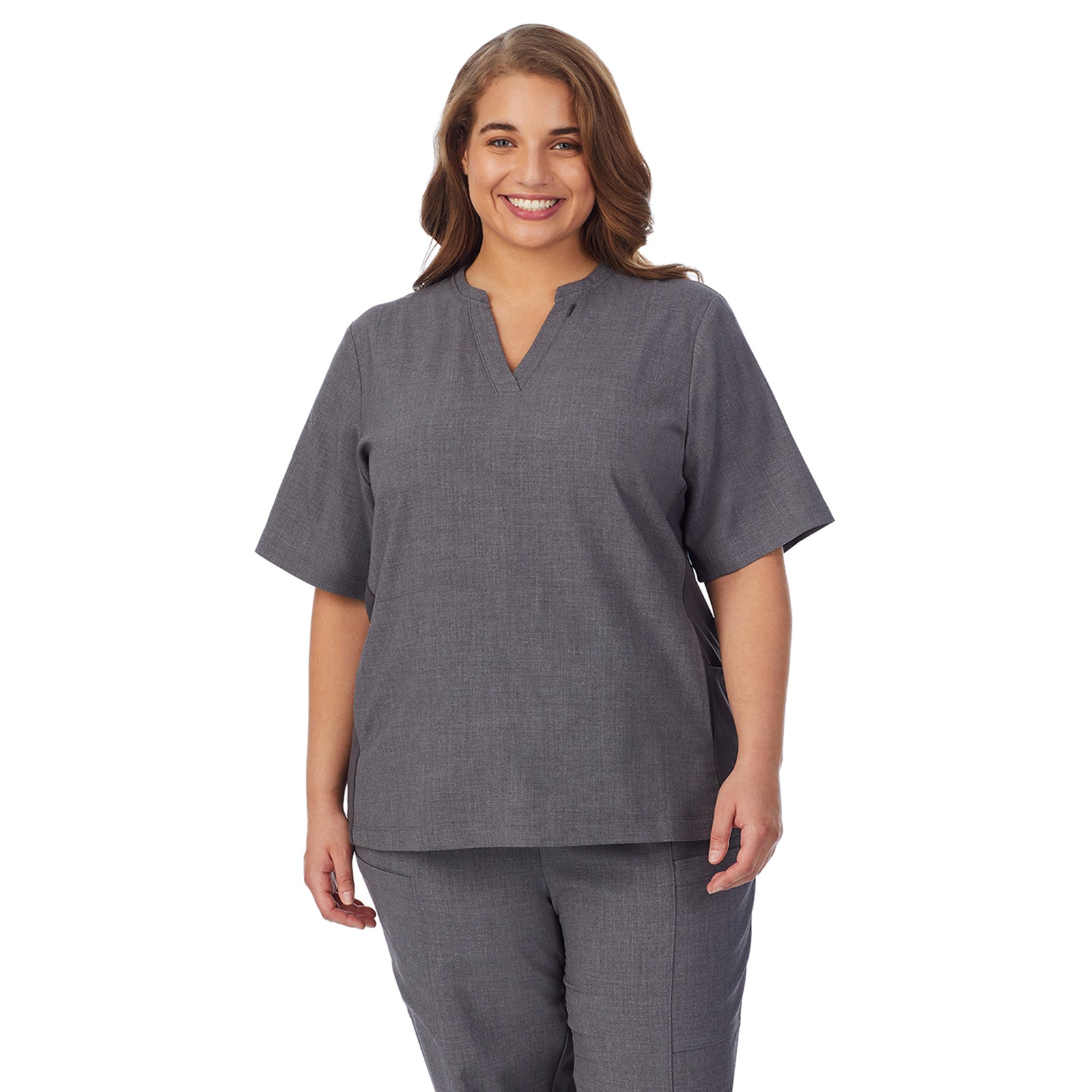 Black;Model is wearing size 1X. She is 5’7”, Bust 42.5”, Waist 34.5”, Hips 46”.@ A lady wearing black scrub split neck top plus.