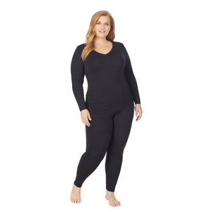  a lady wearing black long sleeve v-neck top