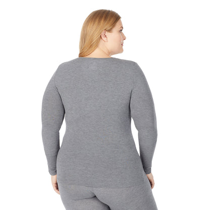 Charcoal Heather; Model is wearing size 1X. She is 5'9", Bust 38", Waist 36", Hips 48.5".@upper body of a lady wearing grey long sleeve v-neck top