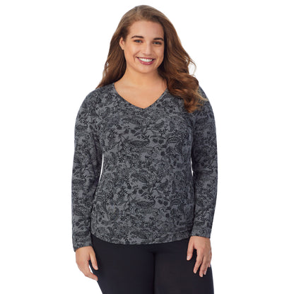 Heather Grey Paisley; Model is wearing size 1X. She is 5'7", Bust 42.5", Waist 34.5", Hips 46".@upper body of a lady wearing grey paisley long sleeve v-neck top