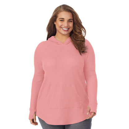 Bright Coral Heather; Model is wearing size 1X. She is 5'7", Bust 42.5", Waist 34.5", Hips 46". @A lady wearing a bright coral heather long sleeve hoodie tunic plus.
